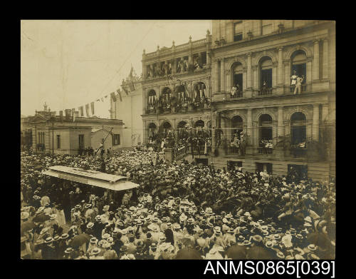 Photograph depicting Australian Light Horse Regiment passing through crowds of onlookers