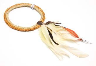 Tiwi woven pandanus armband with feather tuft