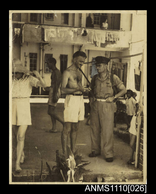 Australians meeting at the Stanley Internment Camp in Hong Kong after the Japanese surrender in August 1945