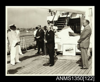 Photograph of J T Neill giving a speech