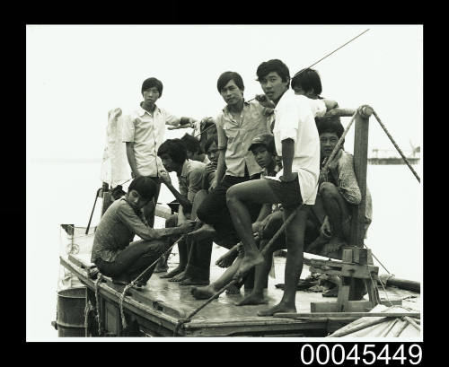 Passengers on wheelhouse of TU DO in Darwin Harbour