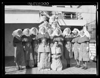 Group portrait of nursing staff aboard the Australian Hospital Ship MANUNDA