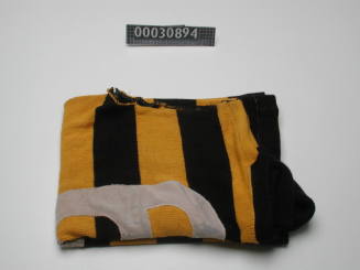 Sleeveless jumper worn by surfers in 1950s