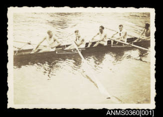 Five oarsmen in a shell