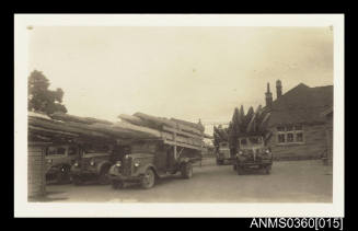 Trucks loaded with rowing shells