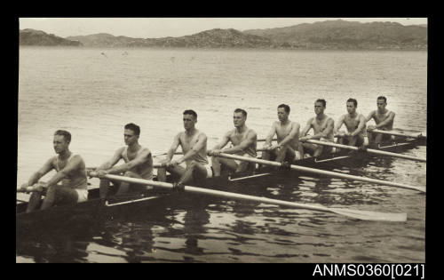 Oarsmen of the NSW crew in their shell