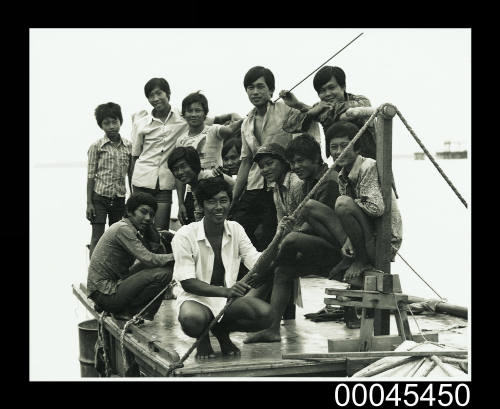 Passengers on wheelhouse of TU DO in Darwin Harbour