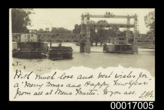 Darling River at Wilcannia: PS TARELLA with barge EMERALD moored alongside. PS MOIRA passing under bridge