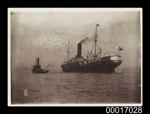 Japanese steamship with tugboat