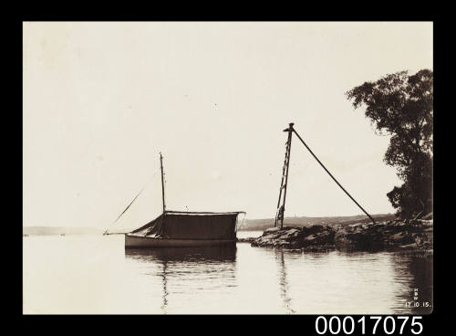 Small moored sailing craft