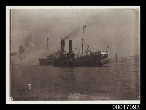 Japanese steamship with tugboat