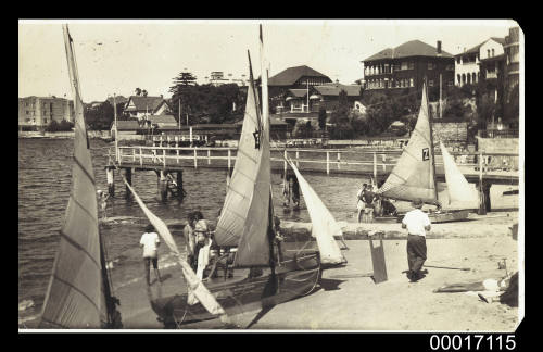 Sailing skiffs on Lady Martins Beach