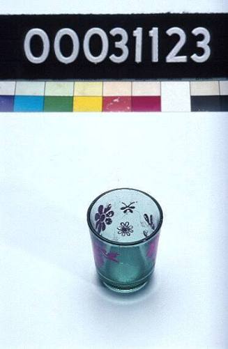 Drinking glass with pink flowers, similar to those used on TU DO