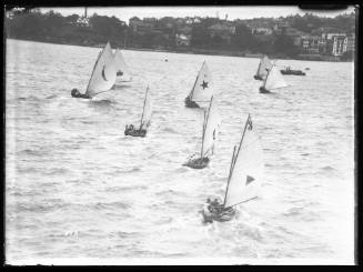Mixed open boat fleet sailing near Kirribilli, Sydney Harbour