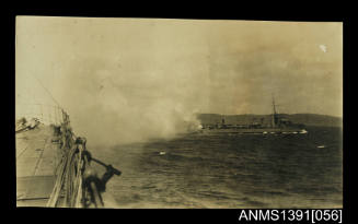 Photograph depicting an explosion between two ships at sea