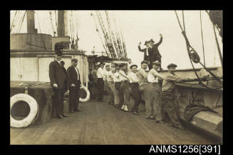 Postcard depicting the crew of the large sailing ship HILLICOTHE