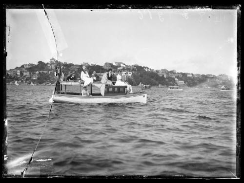 Motor launch on Sydney Harbour, carries 5 Ladies ,3 gentlemen and 1 child ..inscribed 1408