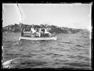 Motor launch on Sydney Harbour, carries 5 Ladies ,3 gentlemen and 1 child ..inscribed 1408