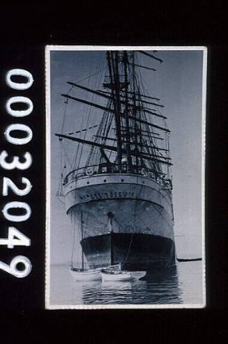 Stern of the four masted barque HERZOGIN CECILIE and two row boats 