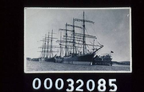 Four-masted barques LAWHILL and OLIVEBANK moored alongside a jetty