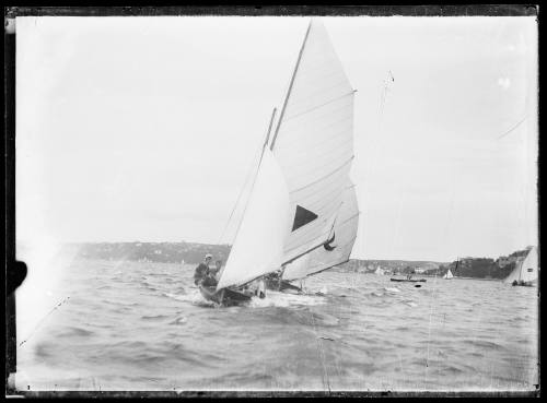 2 gaff-rigged skiffs sail on Sydney Harbour. .. Inscribed 1443.