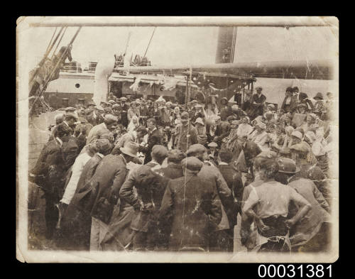 Spectators on a deck of a ship