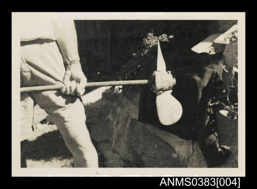 A man holding a propellor