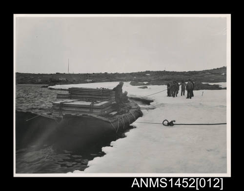 Unloading construction material from pontoon