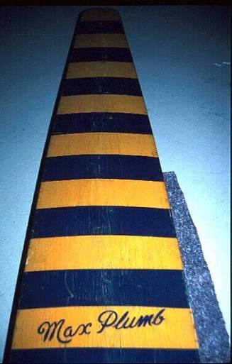 Hollow plywood surfboard decorated with North Cronulla Surf Life Saving Club colours