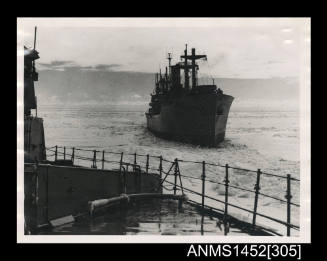 U.S.N. Transport approaching McMurdo through the pack ice