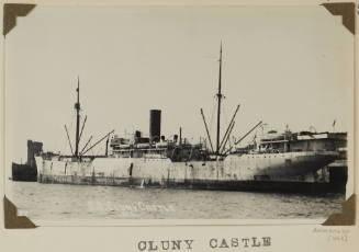 Photograph of  CLUNY CASTLE depicting stern and port side of cargo ship