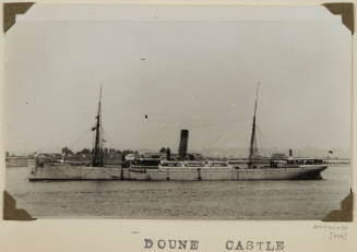 Photograph of  DOUNE CASTLE depicting port side of cargo ship