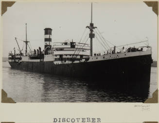 Photograph of  DISCOVERER depicting bow and starboard side of cargo ship