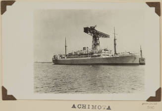 Photograph of  ACHIMOTA depicting starboard side of passenger ship berthed at wharf on port side, crane adjacent ship, midship, on port side