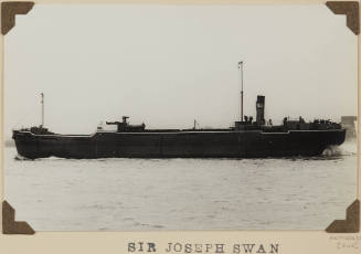 Photograph SIR JOSEPH SWAN depicting port side of coastal cargo ship under way at sea