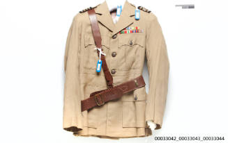 Tropical brown gaberdine coat for the Australian forces issue coat