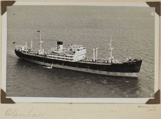 Photograph of  POLAMHALL depicting starboard side view  of cargo  ship at anchor at sea