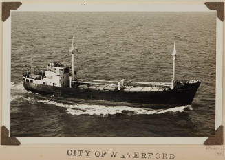 CITY OF WATERFORD depicting starboard side view  of cargo ship under way at sea