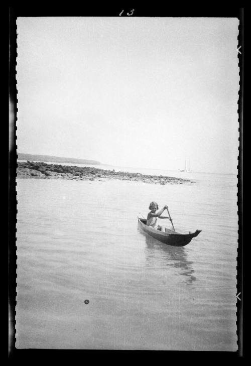 Canoeing in the sandy shallows of a Galapagos Island