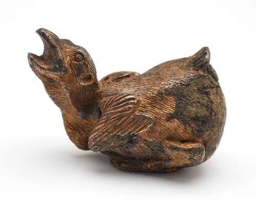 Chick ornament recovered from the wreck of the DUNBAR