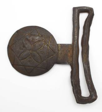 Buckle recovered from the wreck of the DUNBAR