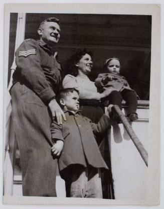 Sergeant J. McFeat and his family aboard the TAMAROA