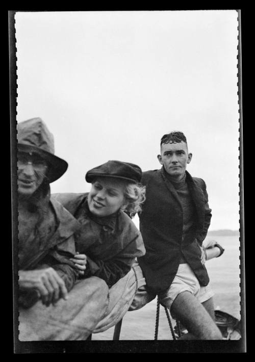 Harold Nossiter Snr in a group on the deck of a yacht