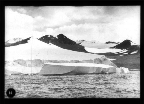 An iceberg breaking away at Cape Crozier