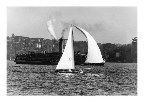 18-foot skiff JANZEN GIRL with ferry in background