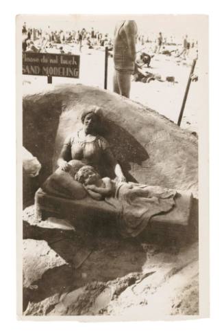 Woman and child modelled in sand by John Suchomlin, Manly