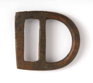 Buckle recovered from the wreck of the DUNBAR