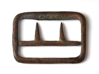 Buckle recovered from the wreck of the DUNBAR