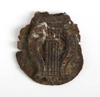 Metal disk with ornament