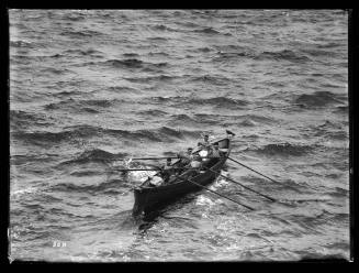 Life saving boat and crew on Sydney Harbour